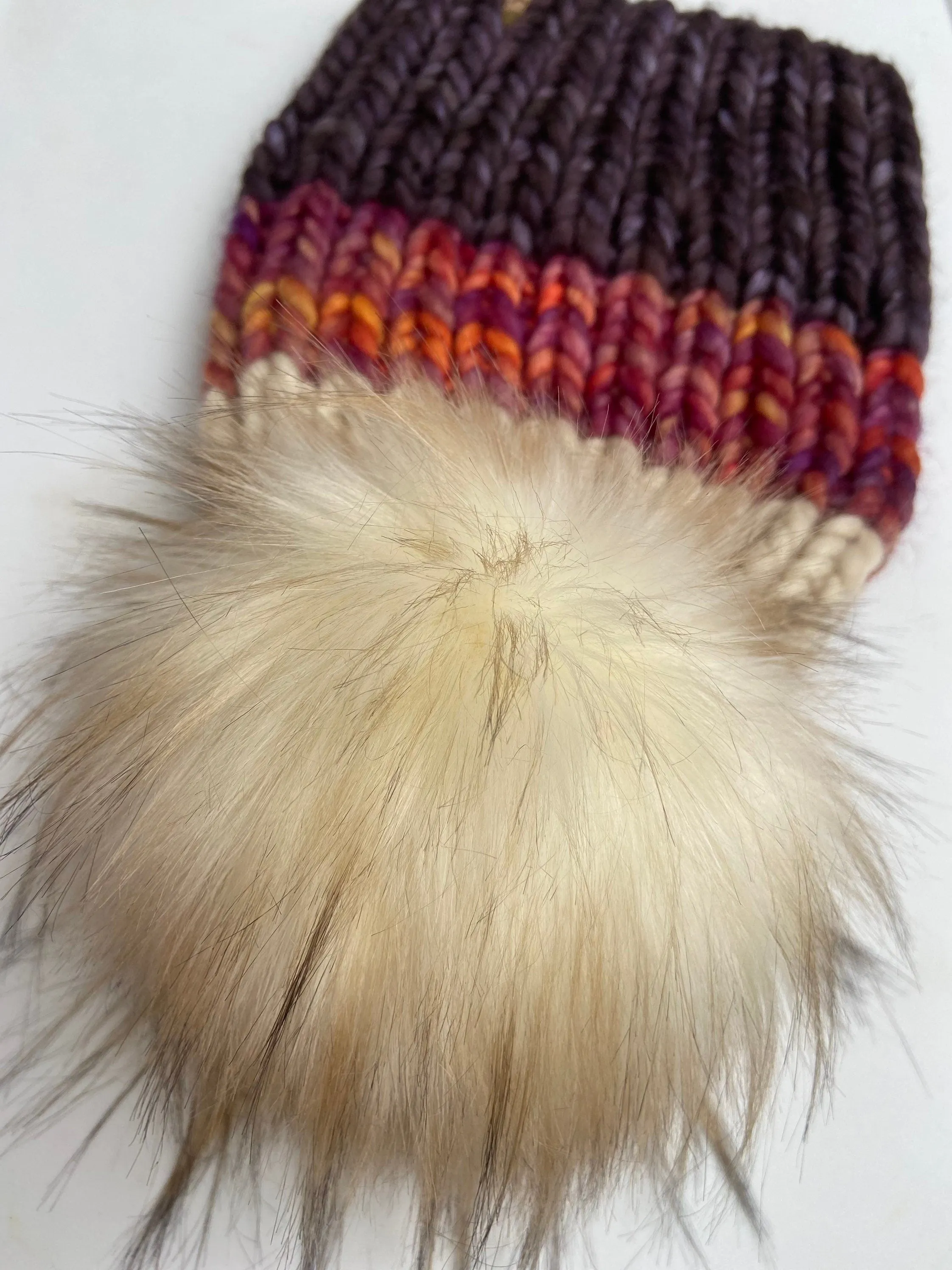 Merino wool knithat with faux fur Pom