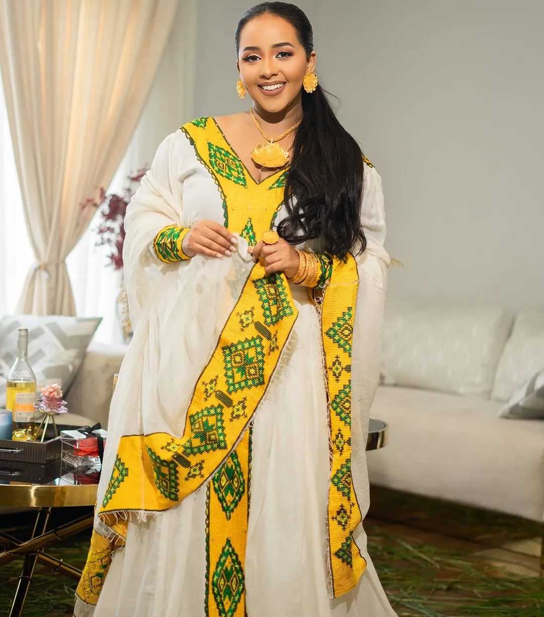 Striking Yellow and Green Handwoven Habesha Dress: with Cross-Stitch Embroidery Traditional Ethiopian Dress